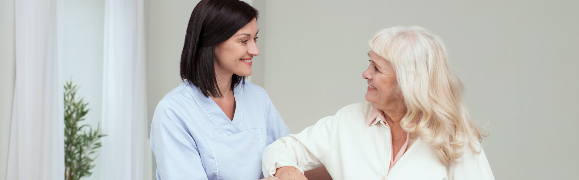 caregiver assist her patient